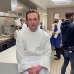 Chef in busy restaurant kitchen